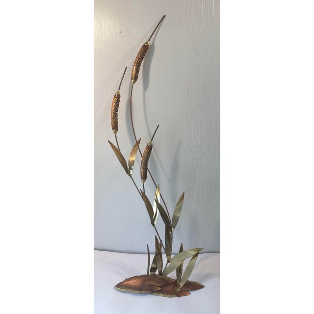 Love this metal Jere style cattail wall art!