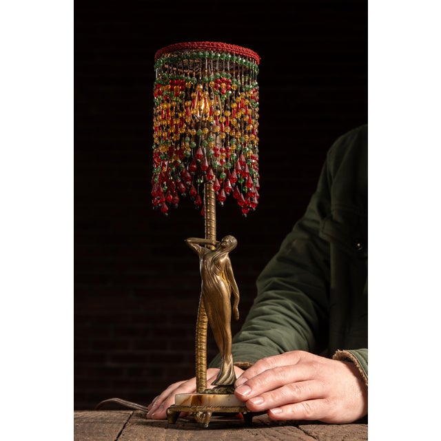 c. 1920s-1930s; Rembrandt Lamp Company - Chicago, IL Cast metal figural lamp depicting a stylized female form in a classic...