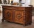 Bring architectural presence and masterful craftsmanship to a dining room, library, or grand entry with this impressive...