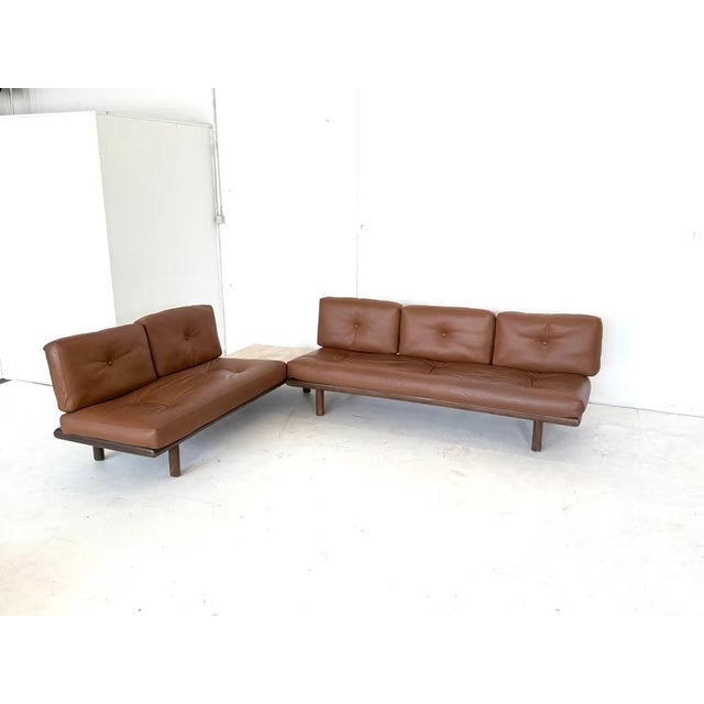 1 kill daybed + 1 leather sofa with travertine table manufacturer: kill international designer: franz köttgen color: brown...