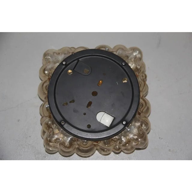 This bubble glass sconce was designed in the 1960s by Helena Tynell. Up to 250V (Europe/UK Standard).The wiring of this...