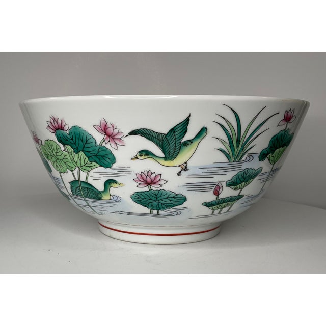 Wildwood Imports numbered white ceramic pedestal bowl with lotus and bird motif. Multiple colors of green and pink...