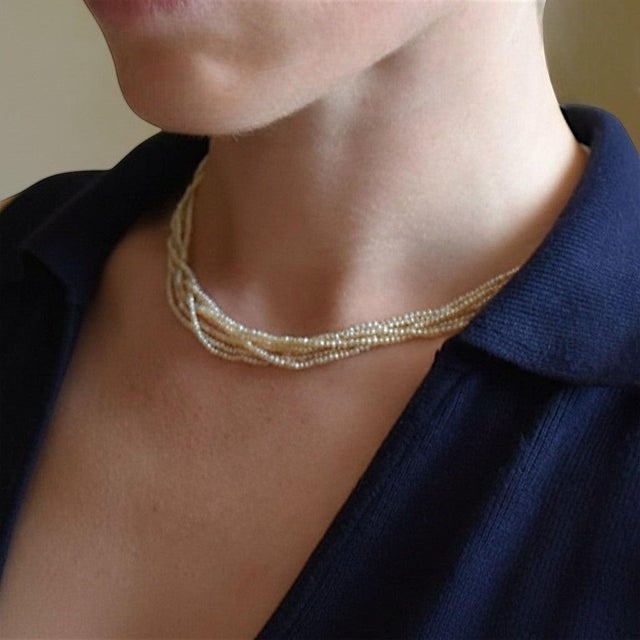 This French Belle Époque multi-strand necklace features six beautifully matched strands of pearls that drape gracefully...