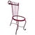 A fire engine red painted iron scroll back chair that could be used in the interior or the outdoors, This chair has no...