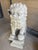A striking and monumental pair of vintage mid-to-late 20th-century Chinese Foo Dog guardian lions, masterfully cast in...