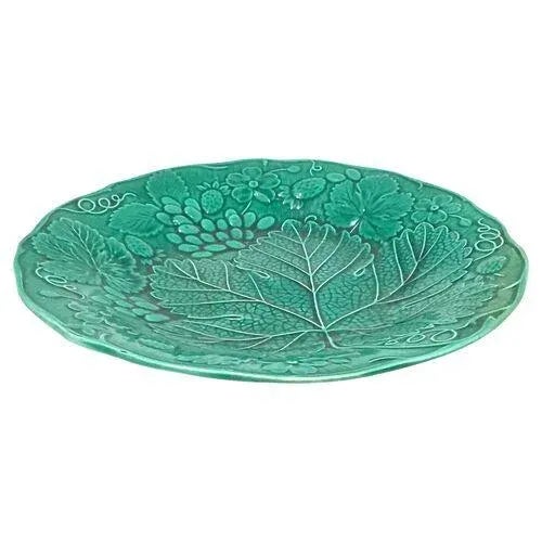 Antique English majolica plate featuring a berry leaf at the center with berry and vine accents. Marked "12" on the...