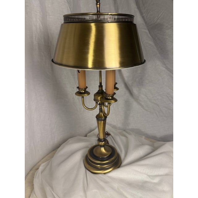 Add a touch of timeless European elegance to your desk, library, or entryway console with this handsome vintage French-...