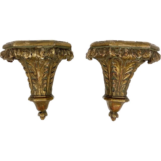 Pair of 19th century Italian gilt wall brackets. Brackets have beautifully carved and painted acanthus leaves topped with...