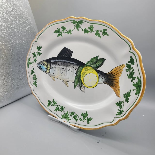 Bring the beauty of Italian craftsmanship to your table with this **Vintage Deruta Hand-Painted Ceramic Oval Platter**,...