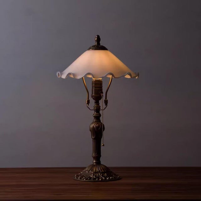 Shade is soft white wave-edge material (soft even light transmission), body is retro copper carved shape (with pull-cord...