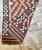 A stunning vintage Kilim runner in the style of Anatolian tribal rugs, entirely hand-woven on a flat loom around the...