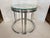 Sleek, sculptural, and effortlessly chic, this Milo Baughman chrome and glass end table brings iconic mid-century glamour...