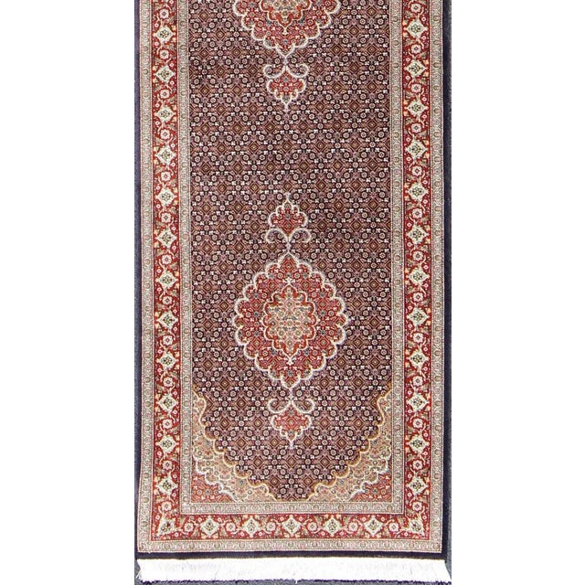 Measures: 2'7 x 12'7 Vintage Persian Tabriz Runner Featuring Central Medallion Motifs on Navy Field. Keivan Woven Arts/...
