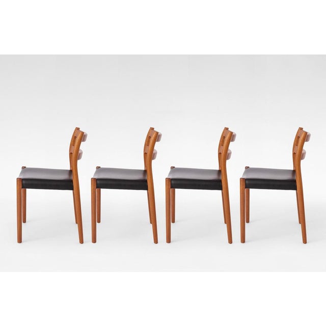 Set of four vintage Model 84 dining chairs designed by Niels Otto Møller and produced by J.L. Møller Møbelfabrik in...