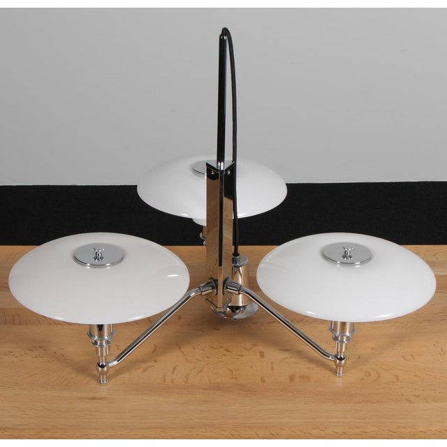 Elegant three-arm brass chandelier "PH akademikrone" by Poul Henningsen for Louis Poulsen, 3/2 opal glass shade set,...