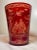 Experience the elegance of the Victorian era with this exquisite 1865 Bohemian cranberry glass bucket vase. The rich...