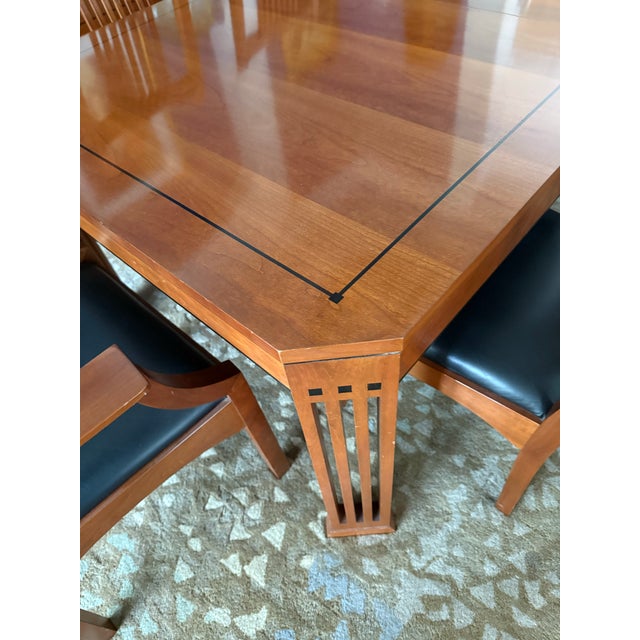 Exceptional Stickley Metropolitan dining collection. Included in this light cherry collection are a table, 2 leaves with...