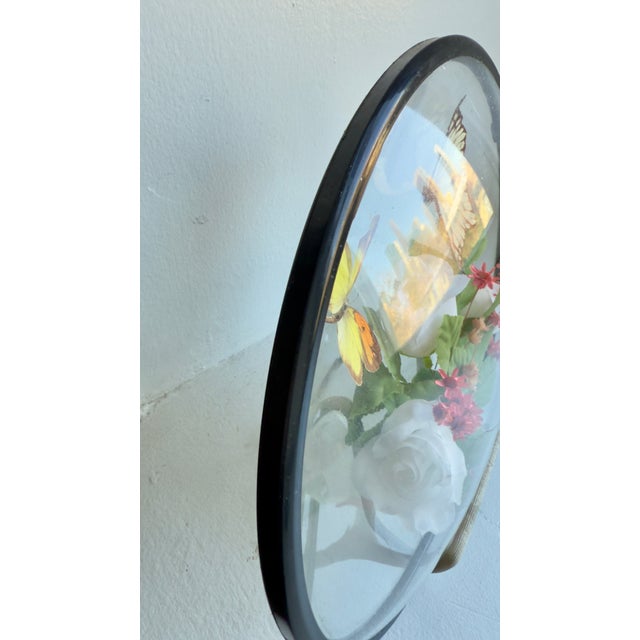 This vintage 1970s framed butterfly and botanical topiary features two preserved butterflies paired with white dried...