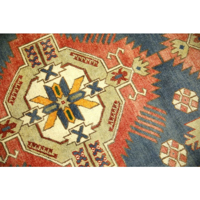 Introducing a one-of-a-kind vintage Turkish hand-knotted wool rug, carefully crafted by skilled artisans using traditional...