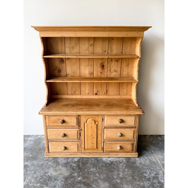 A lovely English pine kitchen dresser from the mid-late 19th century. Sturdy, solid and in wonderful shape. Six total...