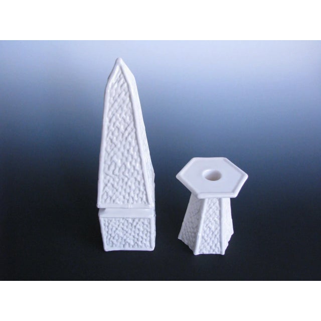 Mid 20th century white ceramic obelisk and candle holder with basketweave design. Made in Italy by Mancer for Raymor....