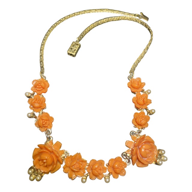 Mid Century Modern Carved Floral Faux Coral and Pearls on Textured Brass Chevron Chain and Orange Push Clasp For Sale
