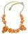 Mid Century Modern Carved Floral Faux Coral and Pearls on Textured Brass Chevron Chain and Orange Push Clasp For Sale