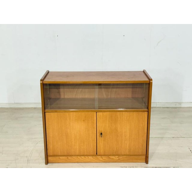 For sale is this beautiful vintage chest of drawers from the 1960s. The cabinet impresses with its timeless mid-century...