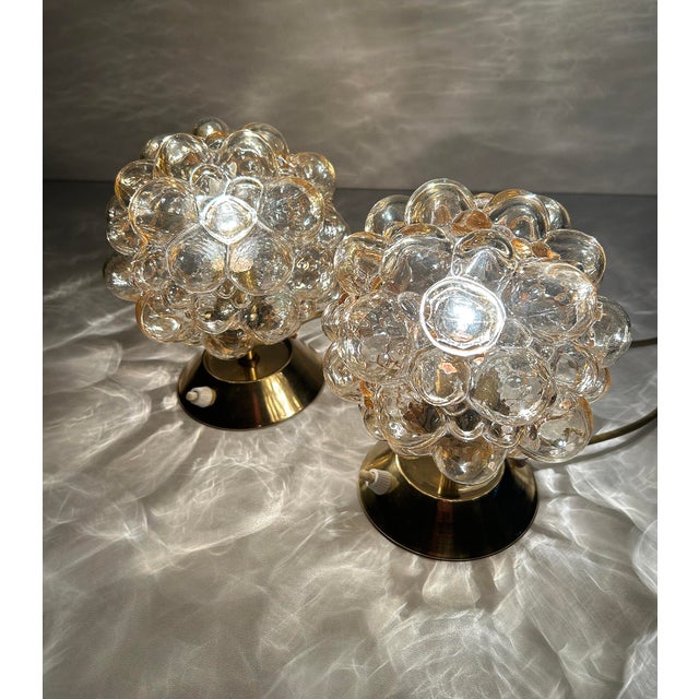 Pair of vintage lamps with a brass base and bubble glass shades - please note that the lights belong to 2 different...