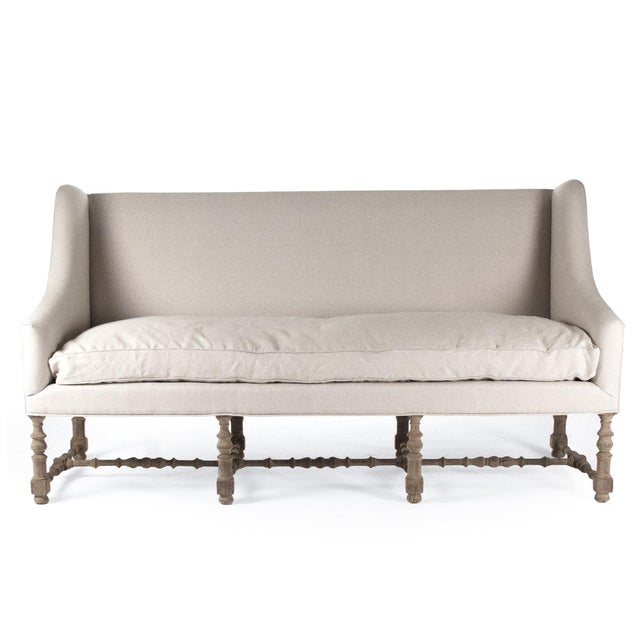 The Worden Bench from Zentique is a French country settee-style bench in dry natural birch with natural linen upholstery,...