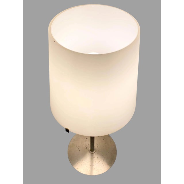 "3247" is a floor lamp, derived from the classic table lamp called "3247TA", originally designed by FontanaArte in 1954,...