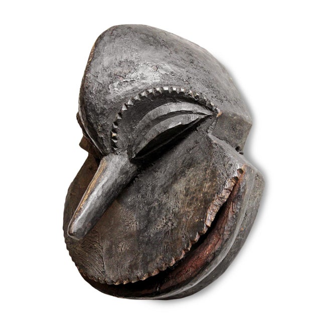 Original vintage hand carved wood mask from the Hemba people of Democratic Republic of Congo. Traditional stylized...