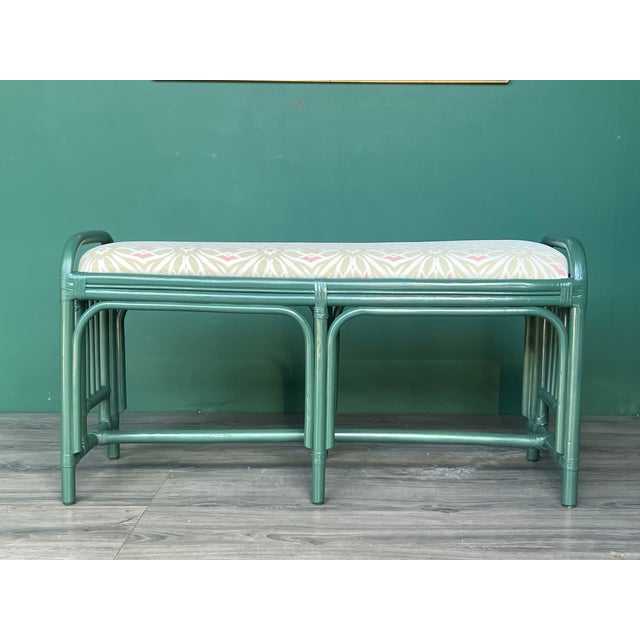 Vintage Bamboo Bench This bench is newly lacquered in green high gloss and the cushion is recovered in a floral rayon,...