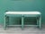 Vintage Bamboo Bench This bench is newly lacquered in green high gloss and the cushion is recovered in a floral rayon,...