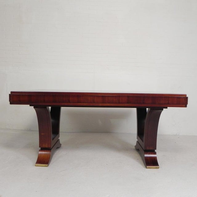 This table stands on elegant legs with a beautiful brass rim at the ends. A jewel in your living room or office! Height:...