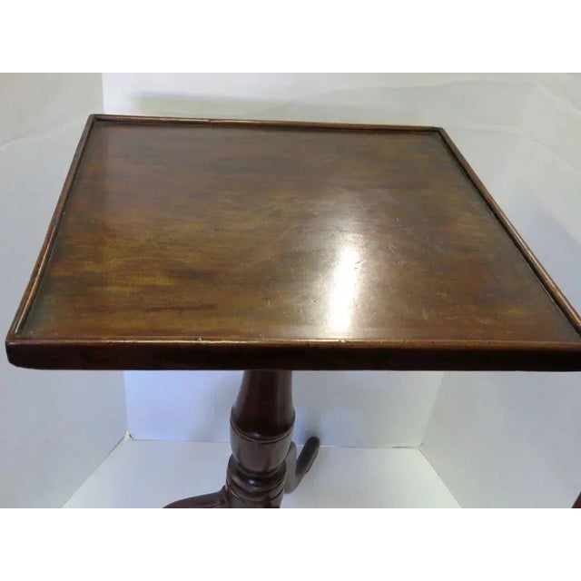 JC 30 New England candlestand with square molded top. Original finish. 16 x 16 1/2 x 27 1790