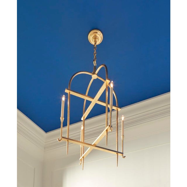 Diego lantern is a simply elegant chandelier with a hammered gold leaf finish that will elevate any design. The...