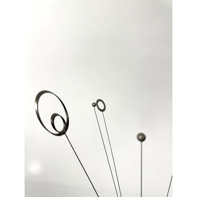 Kinetic artwork titled "Signal" from the 1960s, Made in Italy. These sculptures feature thin metal rods ending in...