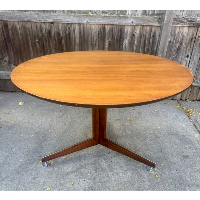 Vintage Edward Wormley for Dunbar table base with a vintage 48-inch walnut top. Top is not Dunbar but very nice quality,...
