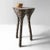 Side table "TRIPOD", black A fusion of sturdiness and elegance, archaism, and modernity, is a distinctive feature of...