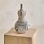 A 1960s Italian bird sculpture by Aldo Londi for Bitossi. Hand-crafted in terracotta, the figure is modeled with a gently...