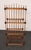 Antique folk art ball and stick etagere/bookcase offering multiple storage/display options while occupying a relatively...