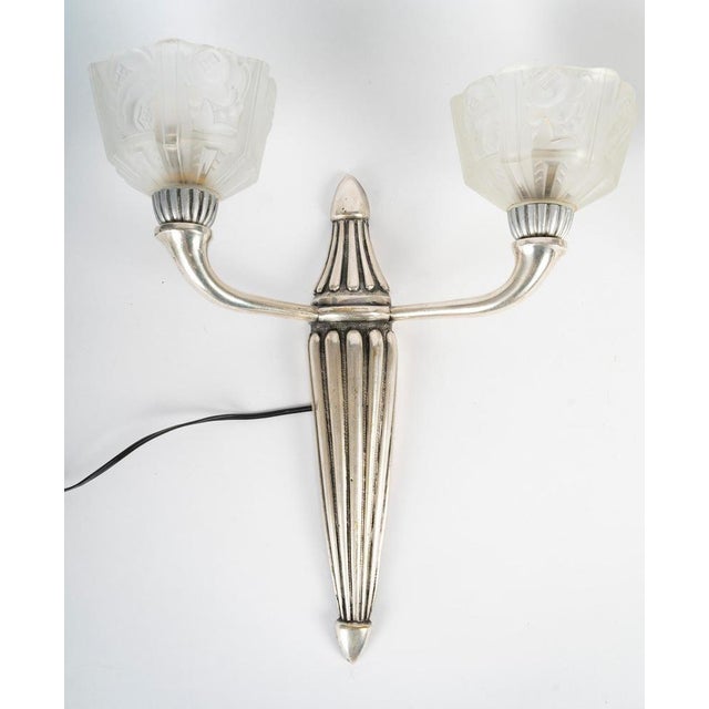 Pair of silver-plated bronze wall sconces with glass tulip shades, art deco, 1930. Pair of art deco-era wall sconces,...