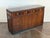 1940's walnut and brass credenza in vintage condition. Discoloration on the top and patinated wood all around. Appears...
