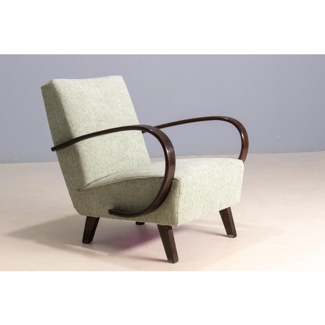 Pair of armchairs model h-227 designed by jindřich halabala for up závody brno in czechoslovakia during the 1930s. This...