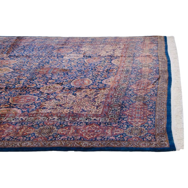 :: Arabesque filled roundel center medallion, each point bearing finials of germinating seeds with detailed interior...