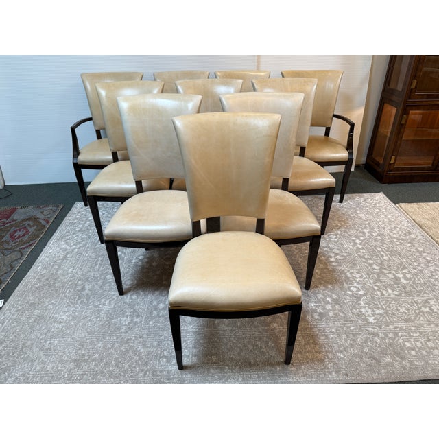 Design Plus Gallery presents a Set of Ten Illusion Leather Dining Chairs from Nancy Corzine. The chairs a creamy taupe...