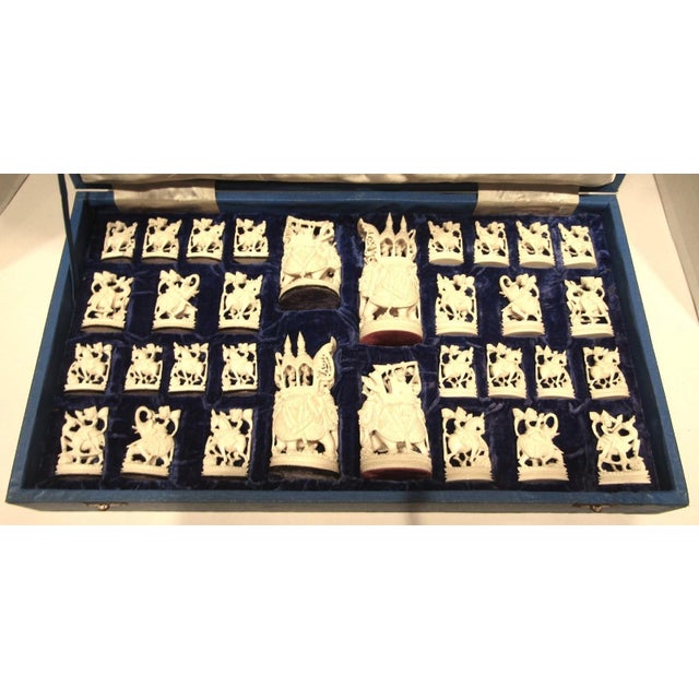 The Antique Rajasthani Indian Ivory Colored Bone Complete Hand Carved Chess Set is a unique and intricately crafted piece...