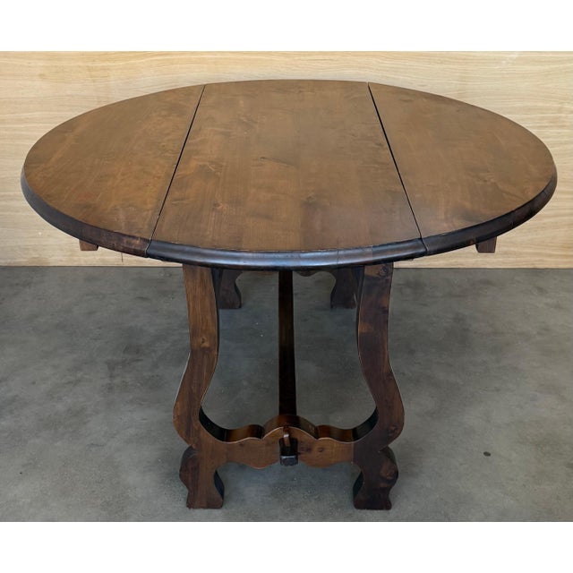 Spanish Spanish 20th Century Walnut Drop-Leaf Table with round Top and Lyre Legs For Sale - Image 3 of 18