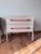 A beautifully understated pair of Rosedale Nightstands by Four Hands, combining clean architectural lines, warm oak tones,...